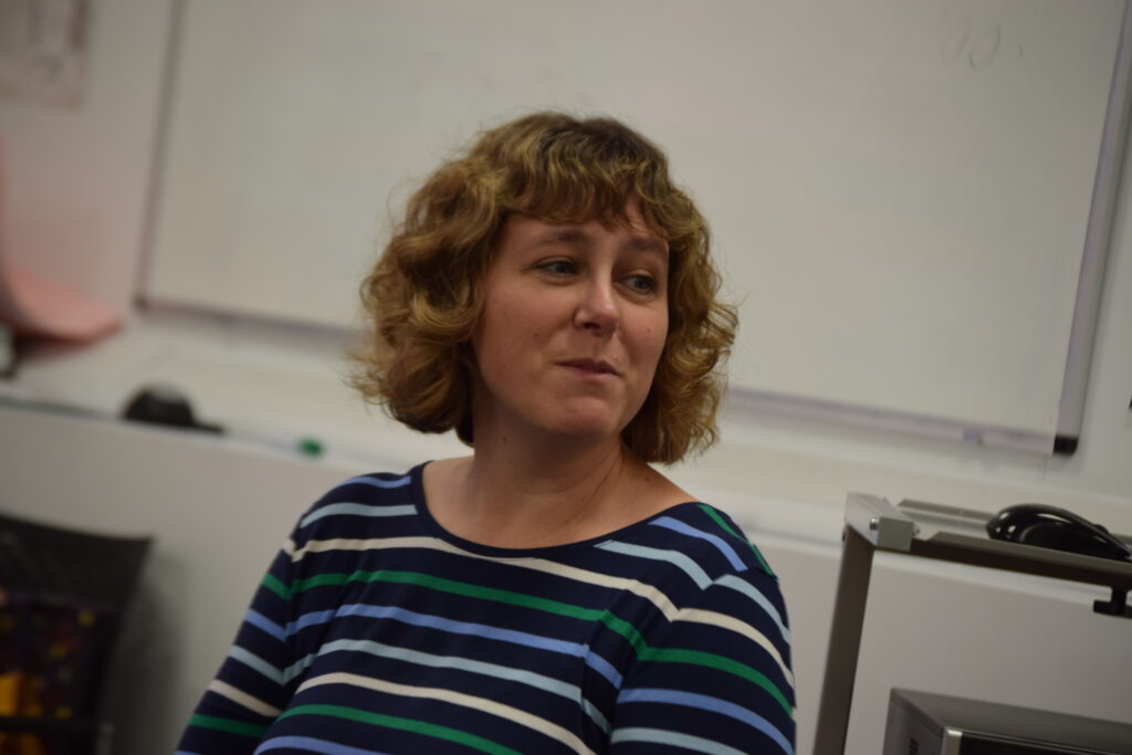 Novelist Kate Mallinger pictured speaking to a class of Central Saint Michael's Sixth Form students