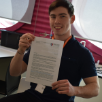 Louie Clarke pictured with his offer letter from Oxford University