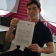 Louie Clarke pictured with his offer letter from Oxford University