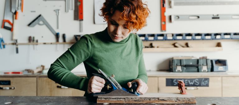 Woman doing woodwork