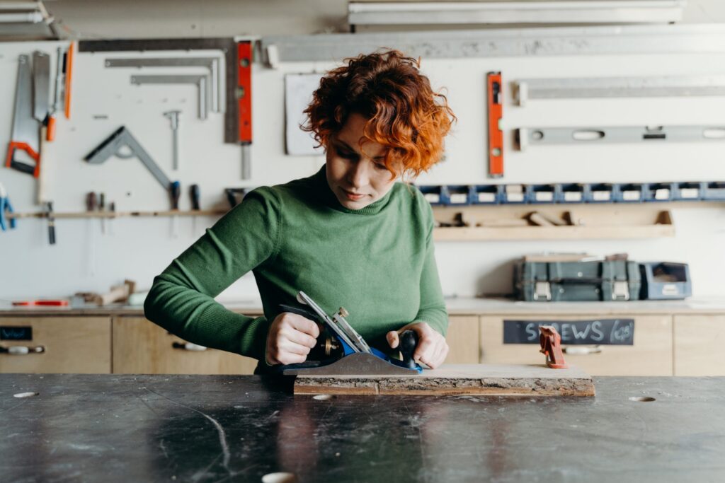 Woman doing woodwork