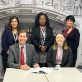 Representatives from Central Saint Michael's and University of Law sign agreement