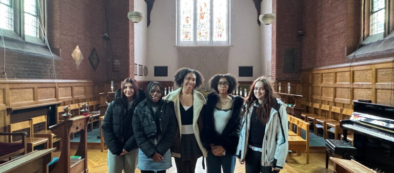 Five female students in the Cambridge University hall