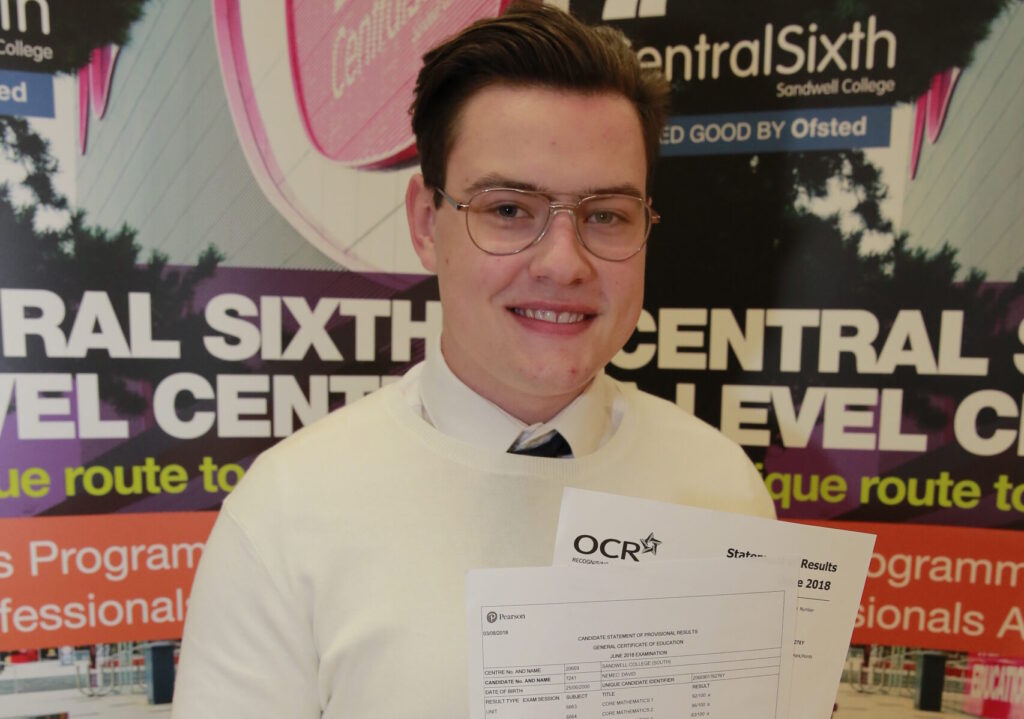 Former student David Nemec with his exam results