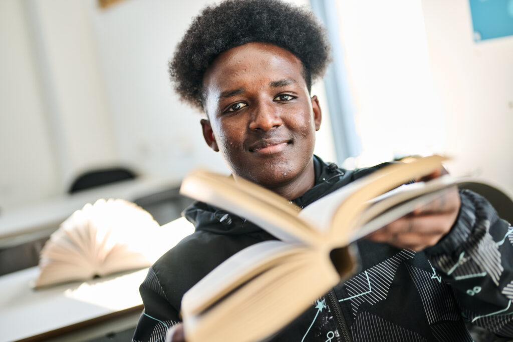 Student with book open