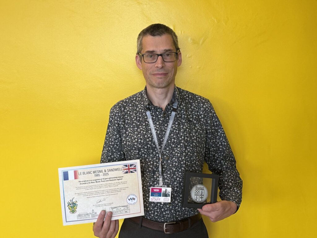French teacher Michael Lacoult with his Sandwell Twinning Association Award