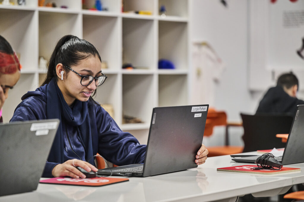 Female student working on laptop