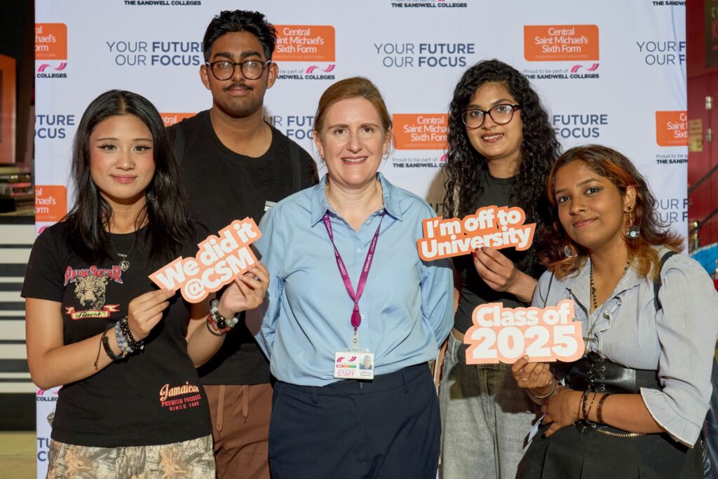 Lecturer celebrating results with four students